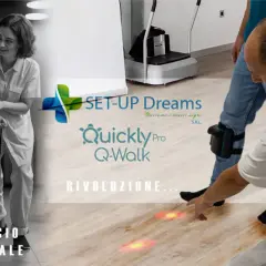 Assistenza a un anziano con bastone, mentre un terapista guida i passi base con un sistema Q-Walk.