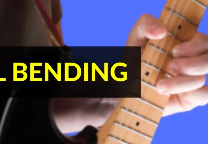 Mano che preme le corde di una chitarra elettrica, mostrando la tecnica del bending.