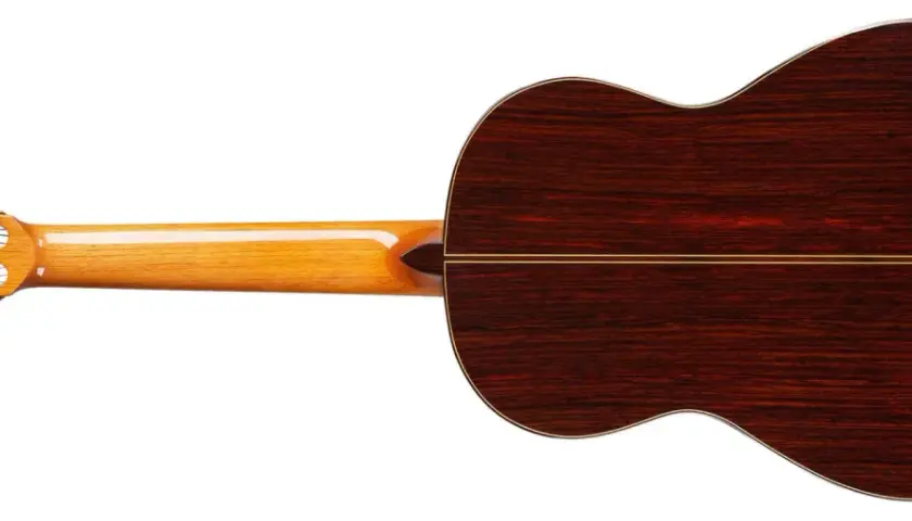 Retro chitarra classica con fondo in palissandro e manico in acero lucido, un capolavoro di liuteria, forse una Jose Ramirez.