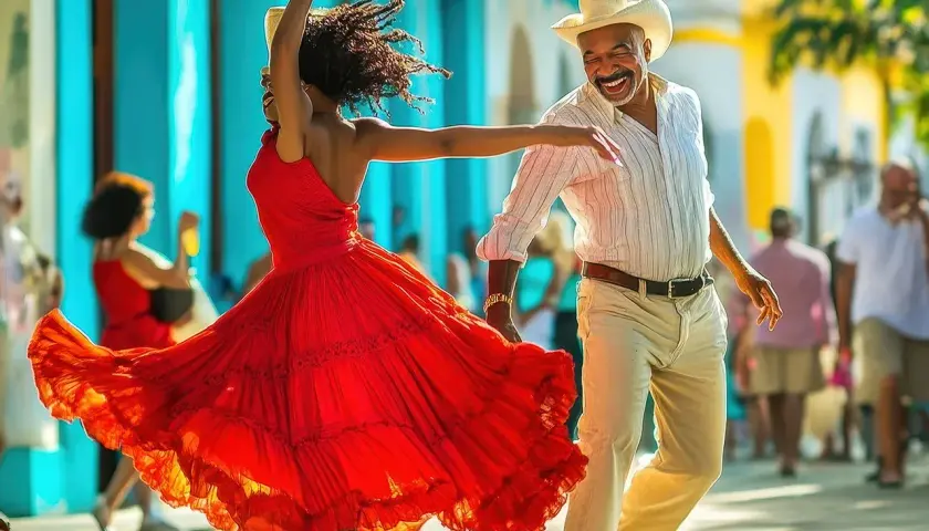 Coppia che balla con gioia, la donna in un abito rosso svolazzante, l'uomo con cappello. Ritmo e passione nei balli cubani.